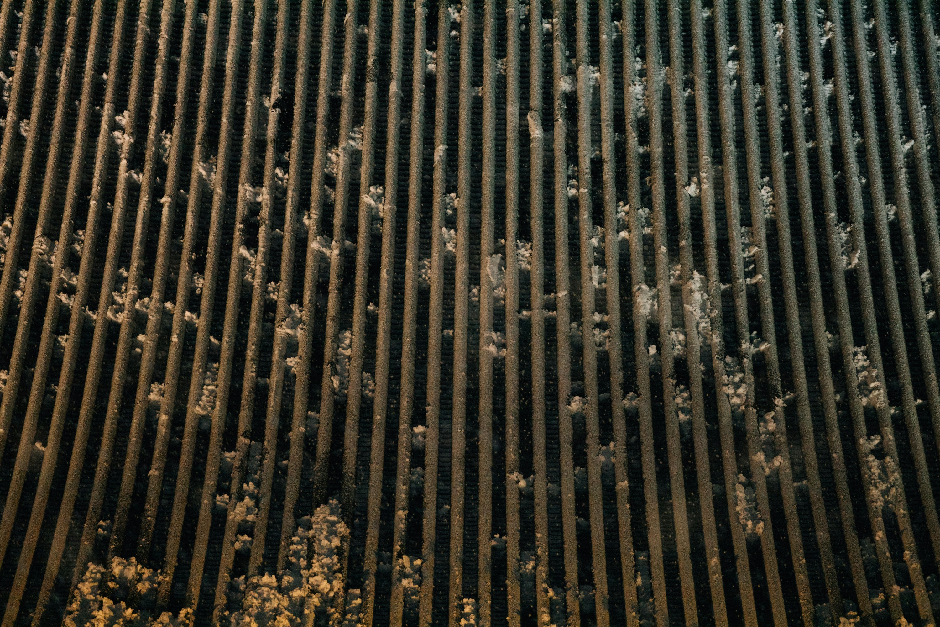 a close up of a grill with a lot of food on top of it