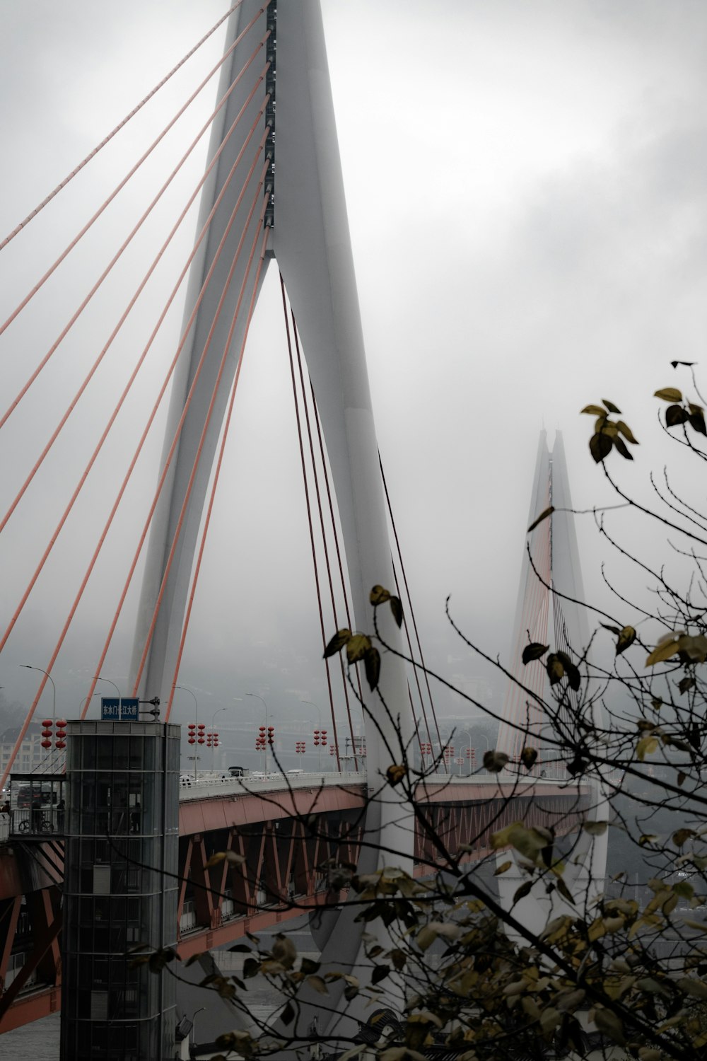 a view of a bridge over a body of water