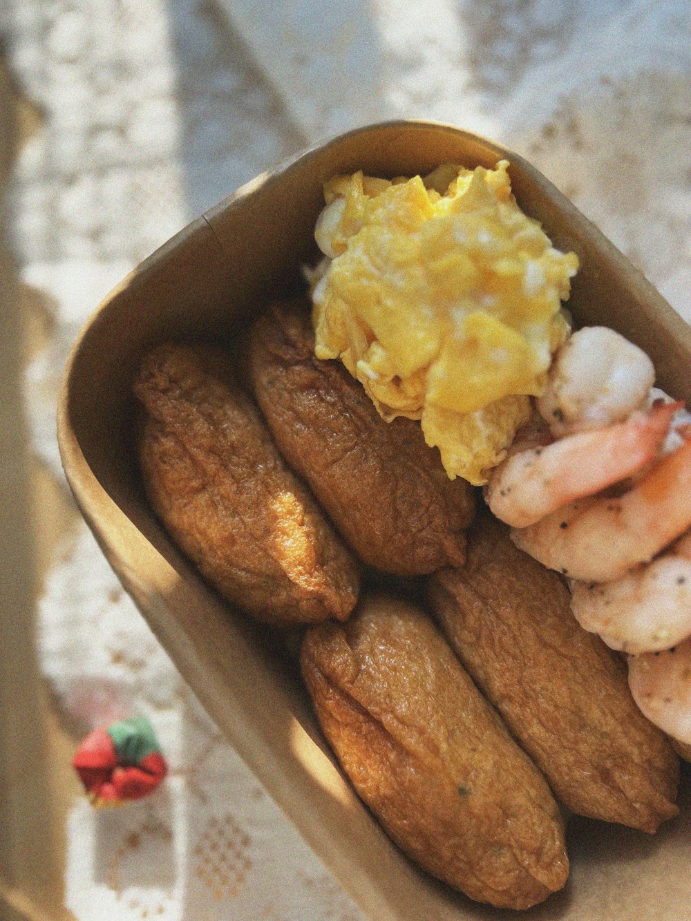 a close up of a box of food on a table