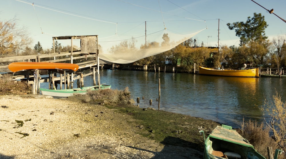 a couple of boats that are sitting in the water