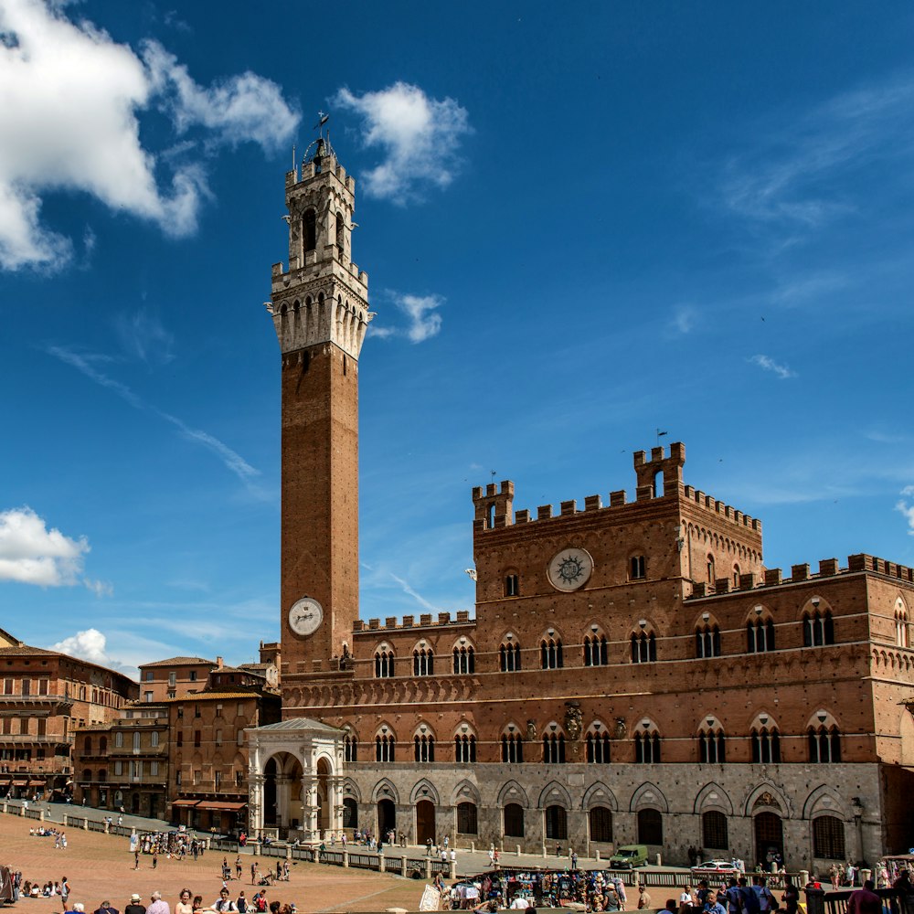 a large brick building with a clock tower