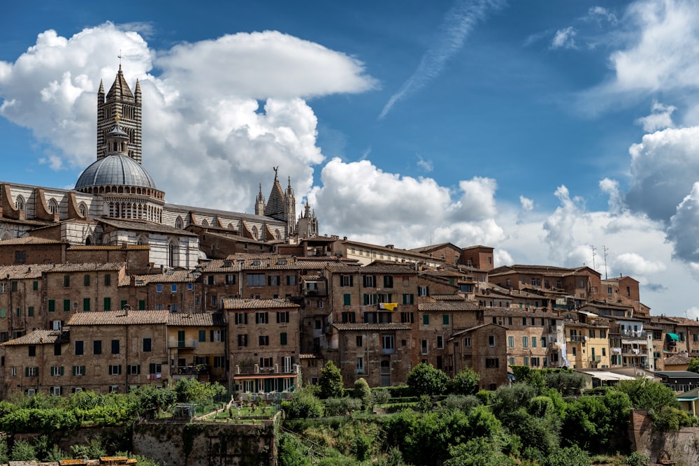 a view of a city with a church on top of it