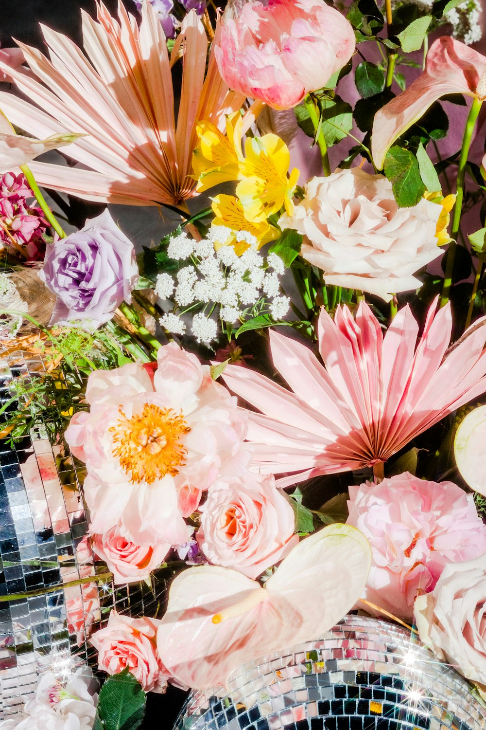 a bunch of flowers that are sitting on a table