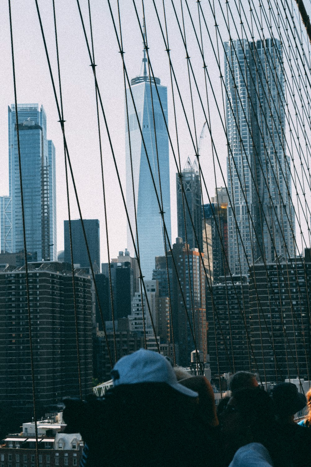 a group of people standing on top of a tall building