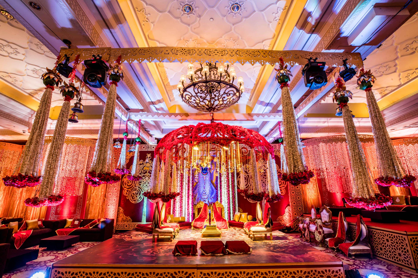 Decorated wedding mandap with warm lighting