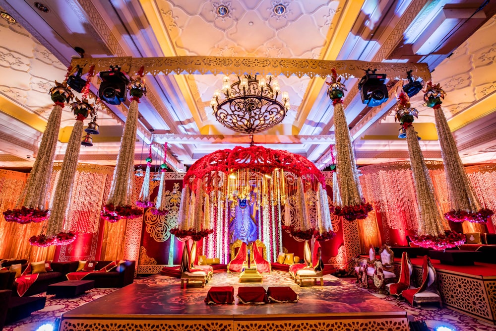 a decorated stage with a chandelier and chandelier