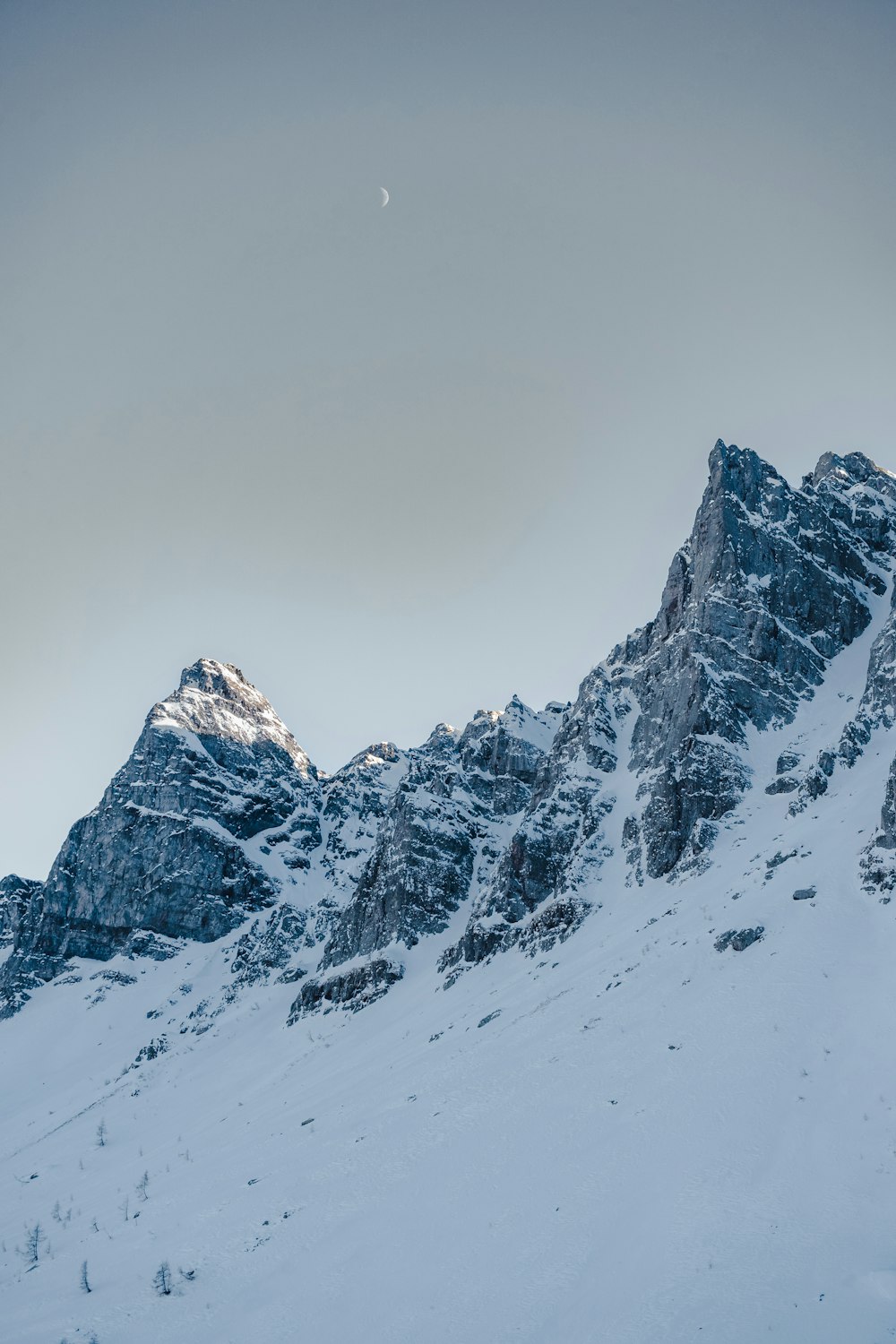 a person skiing down a snow covered mountain