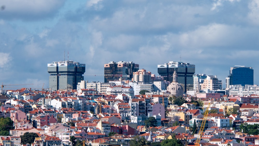 a view of a city with tall buildings