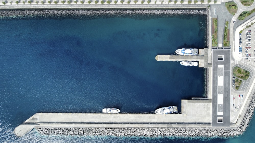 a large body of water next to a pier