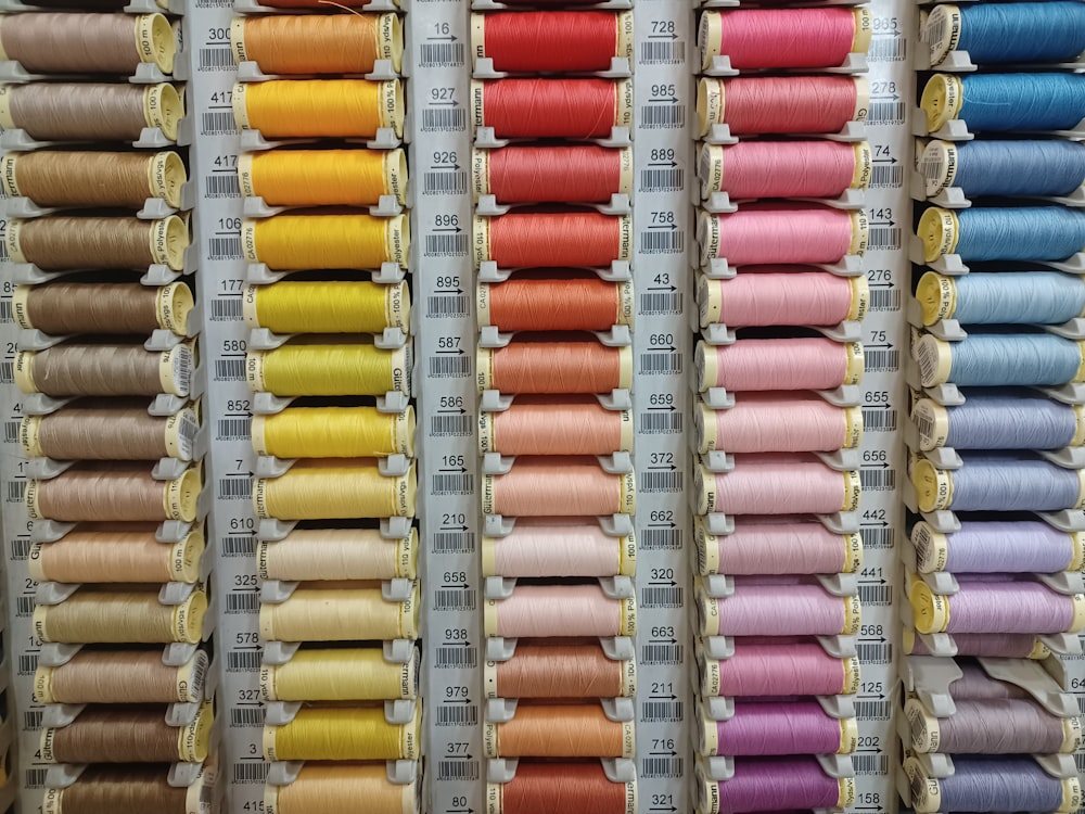 rows of spools of thread in a store