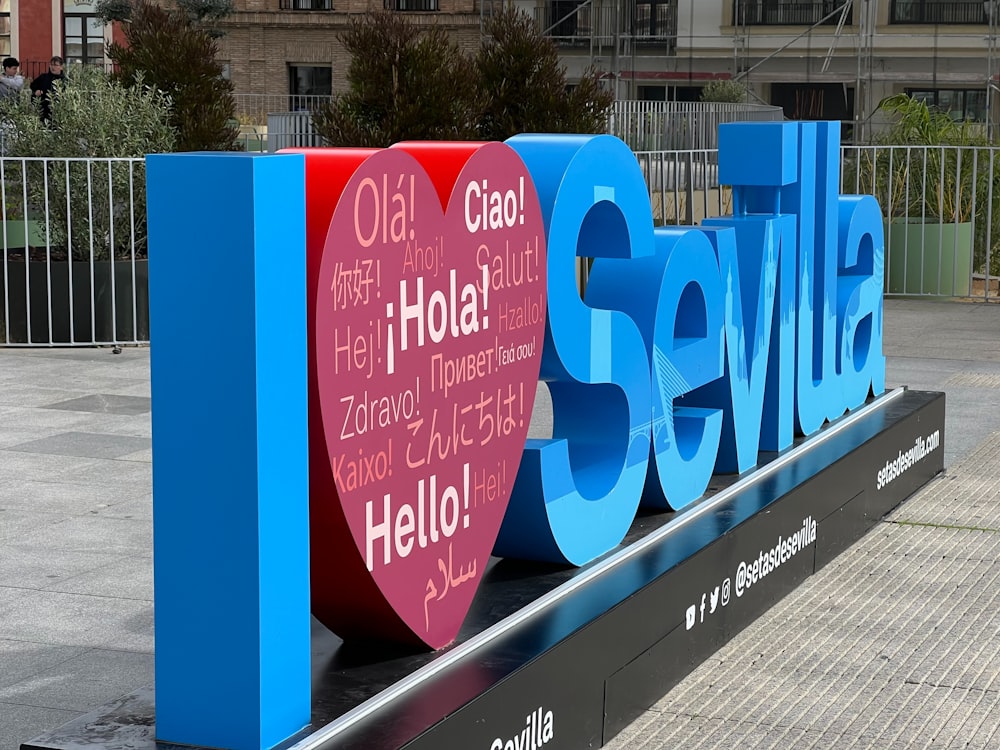 a large metal sign that says sevilla on it