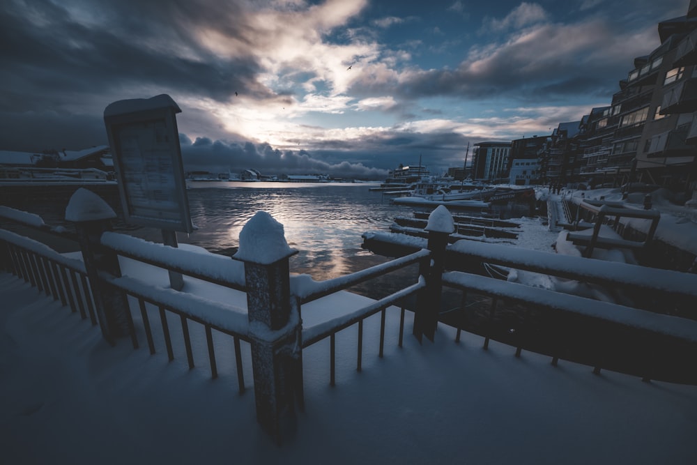 a view of a body of water covered in snow