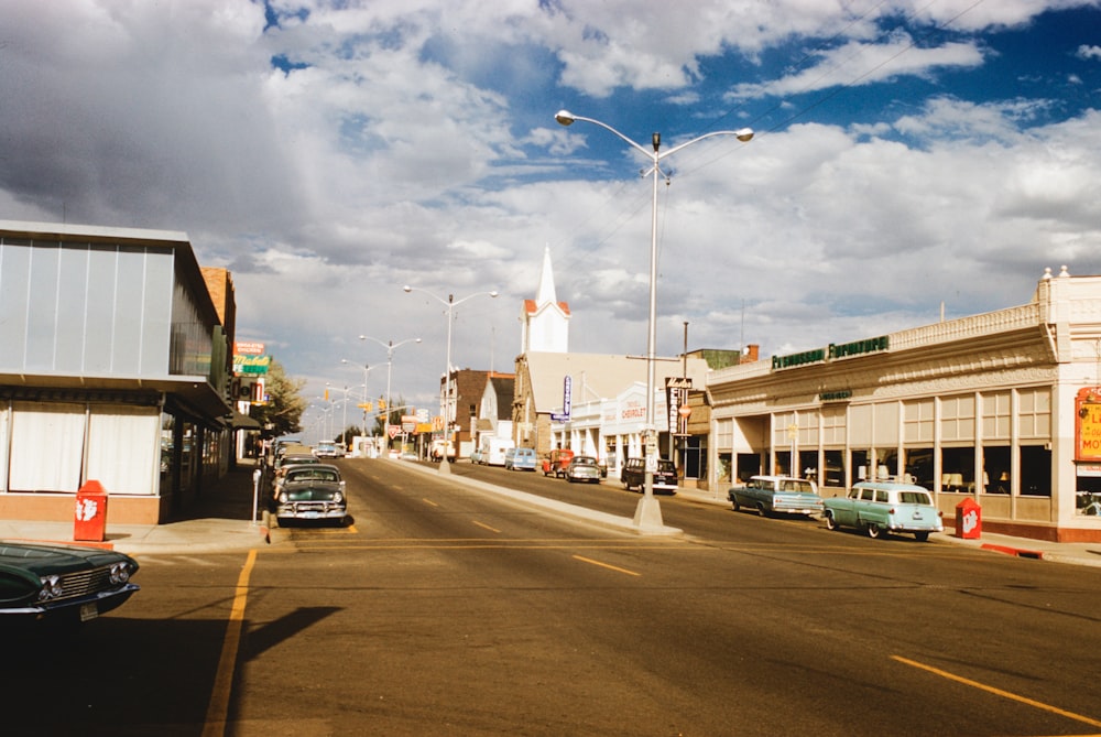 a street with cars parked on the side of it