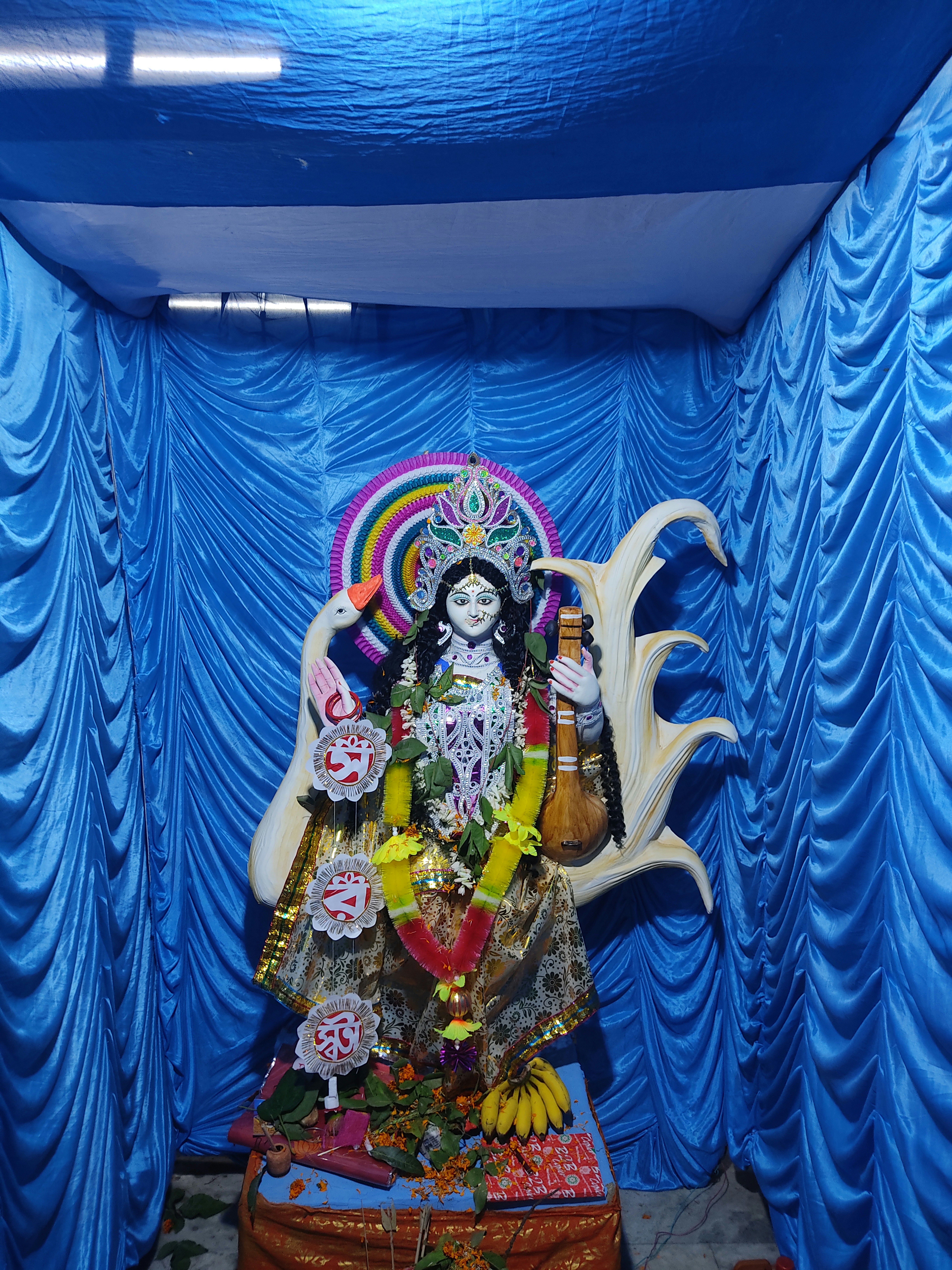 there is a statue of a person on a stage