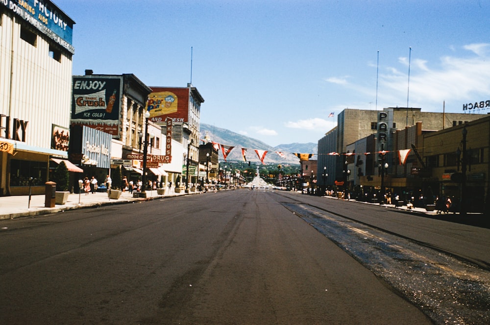 a city street lined with shops and buildings