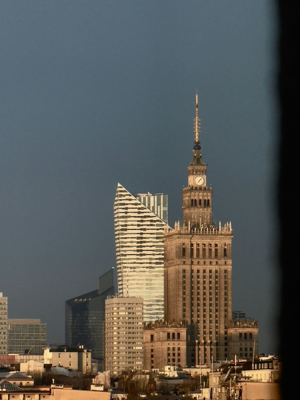 a view of a city with tall buildings