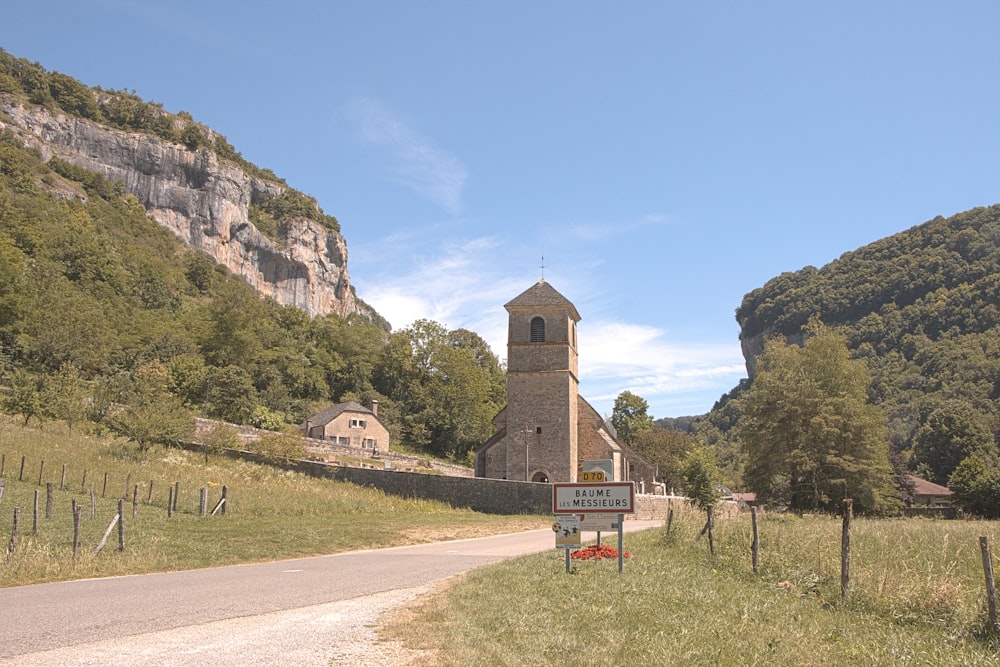 a church in the middle of a country road