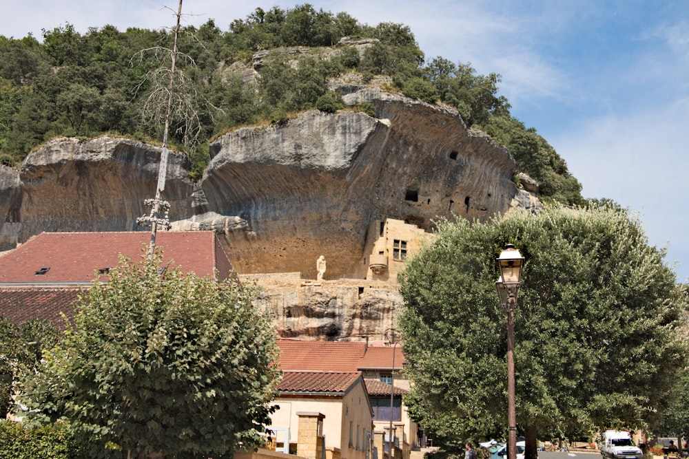 a small town with a mountain in the background