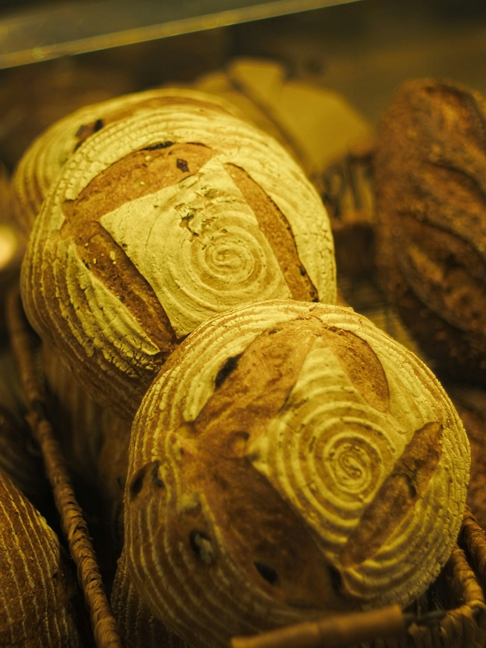 a close up of some breads in a basket