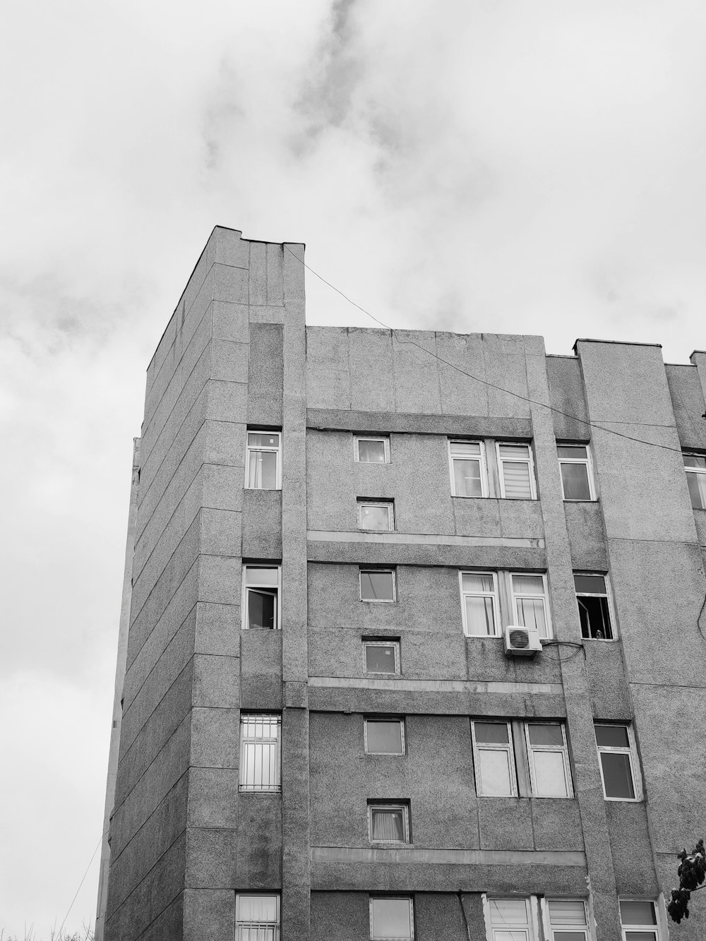 a black and white photo of a tall building