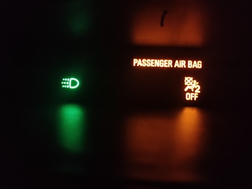 a close up of a traffic light at night