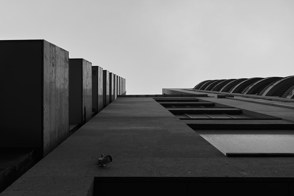 a black and white photo of a tall building