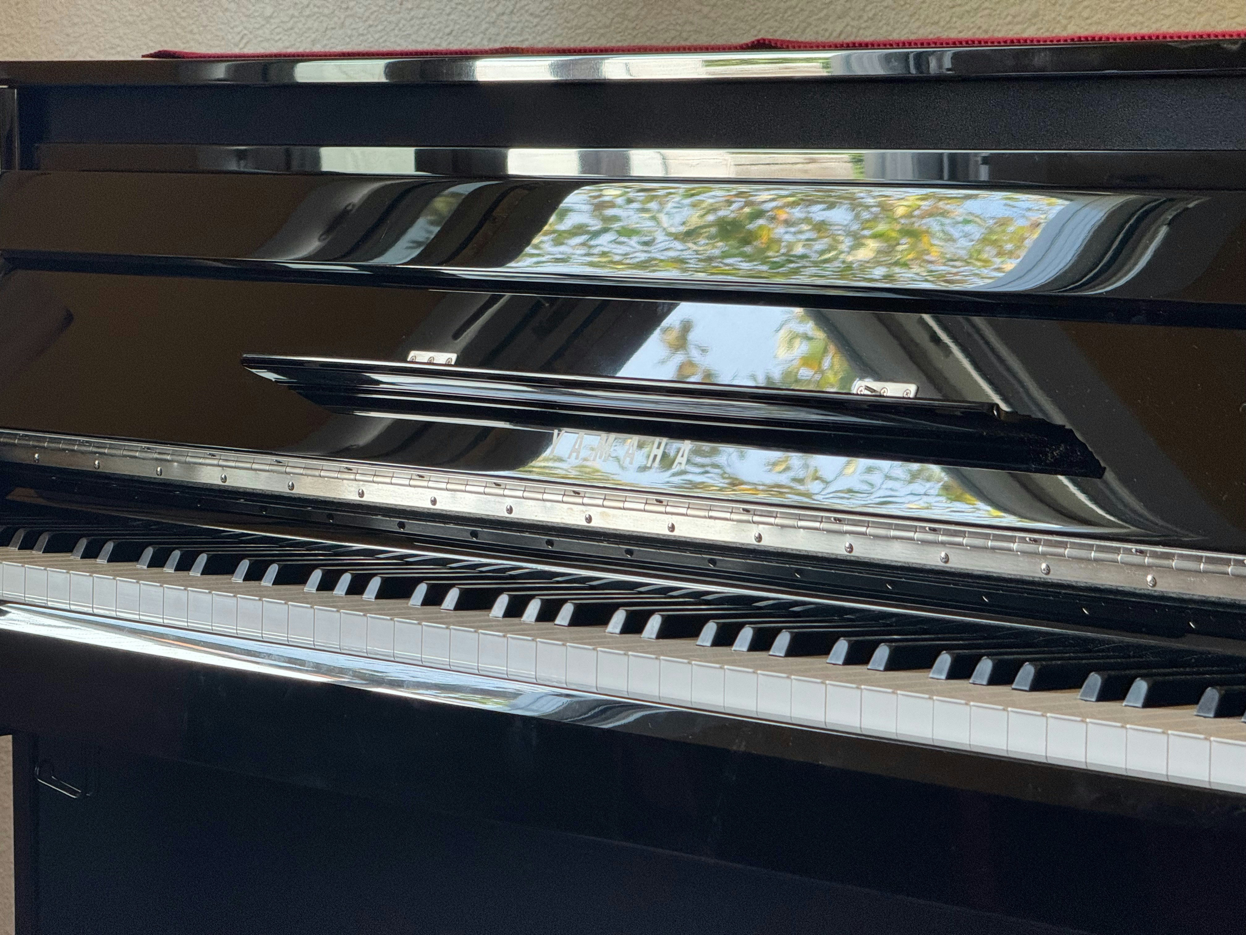 a close up of a piano in a room