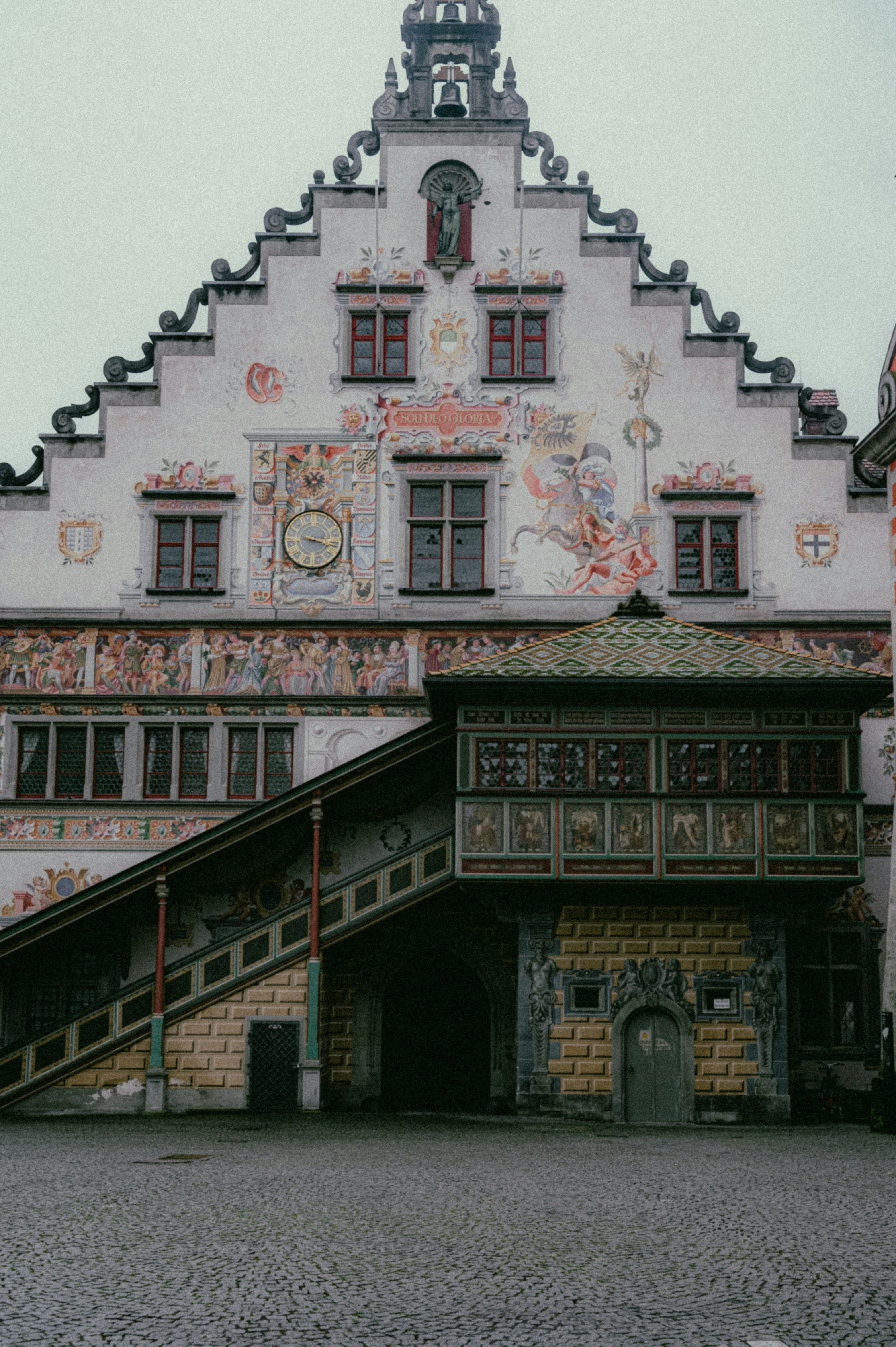 a large building with a clock on the side of it