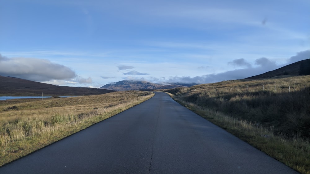 an empty road in the middle of nowhere