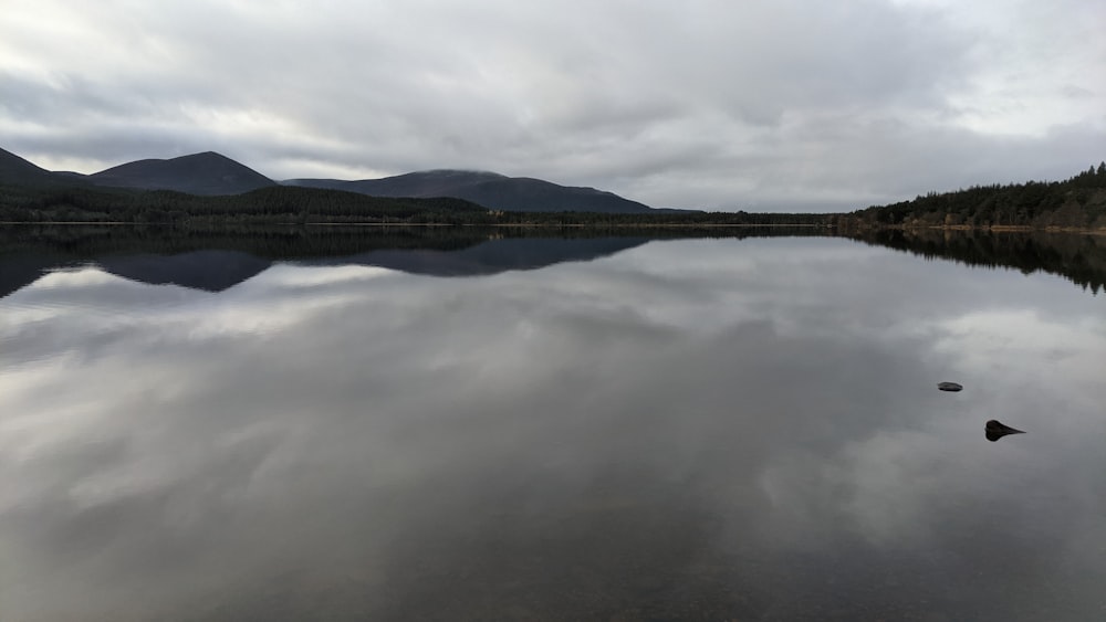 a large body of water surrounded by mountains