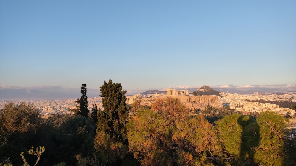 a view of a city from a hill