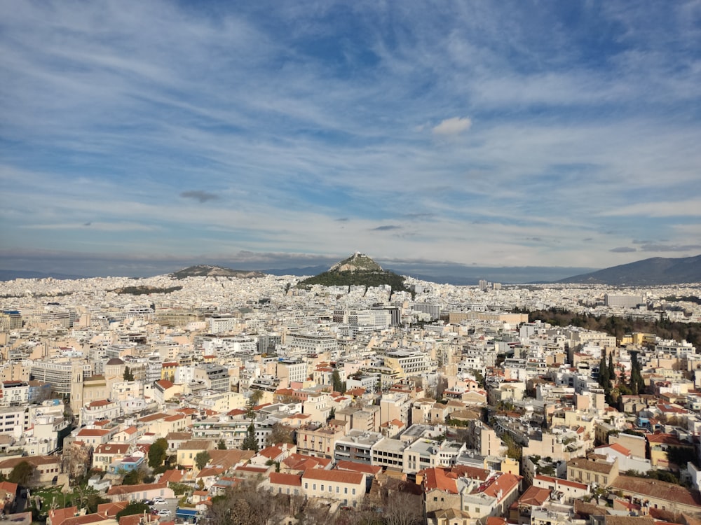 a view of a city from the top of a hill