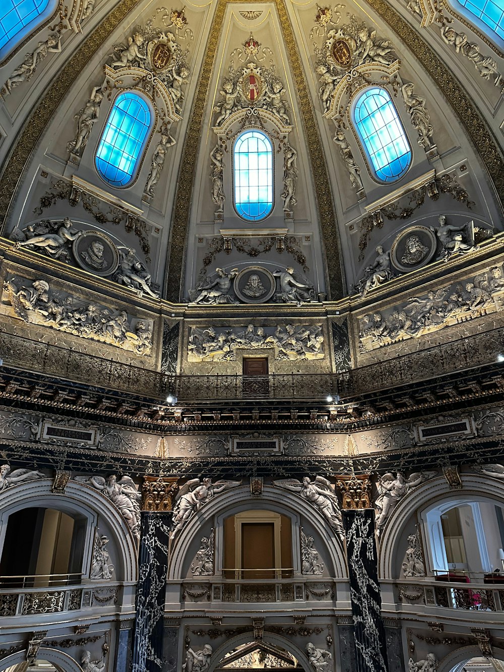 a domed building with a blue skylight above it