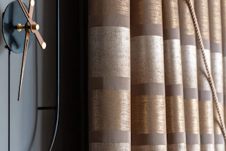 a clock that is on the side of a wall