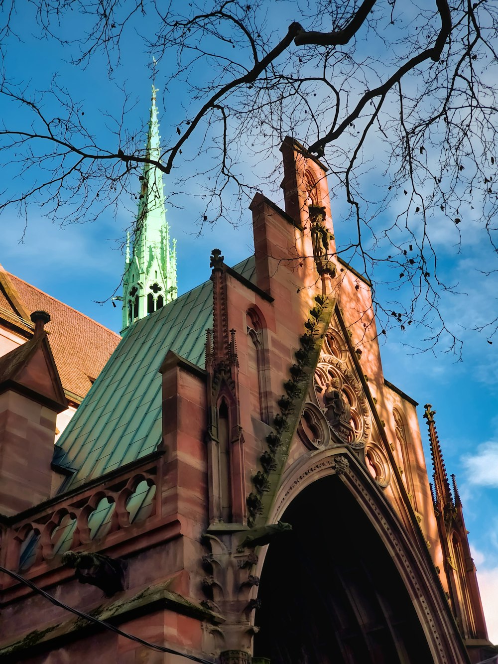 a church with a steeple and a clock tower