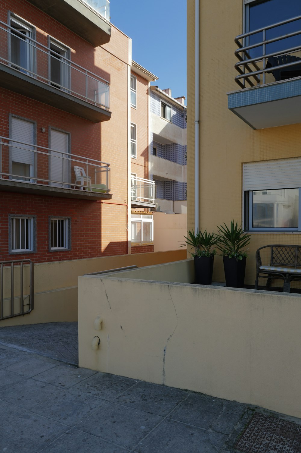 a building with balconies and balconies next to it