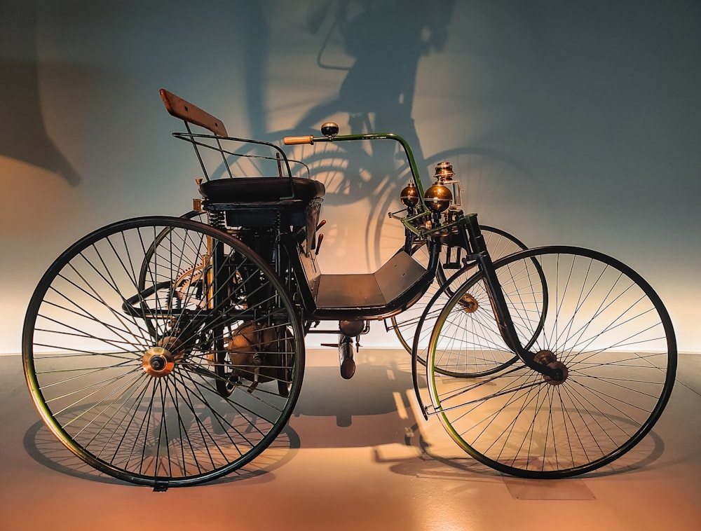 an old fashioned bicycle on display in a museum
