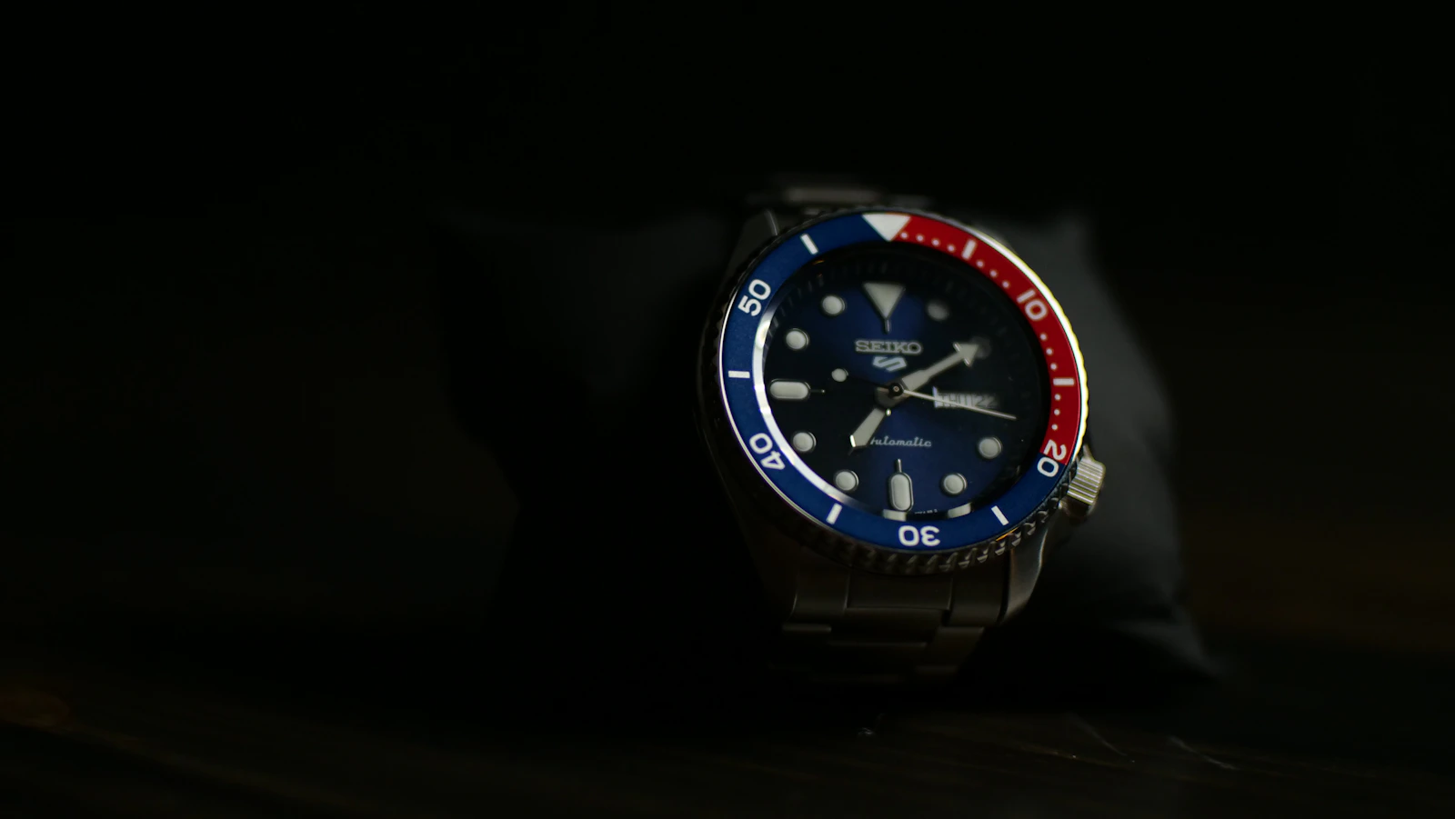 Seiko 5 Sports pepsi bezel angled