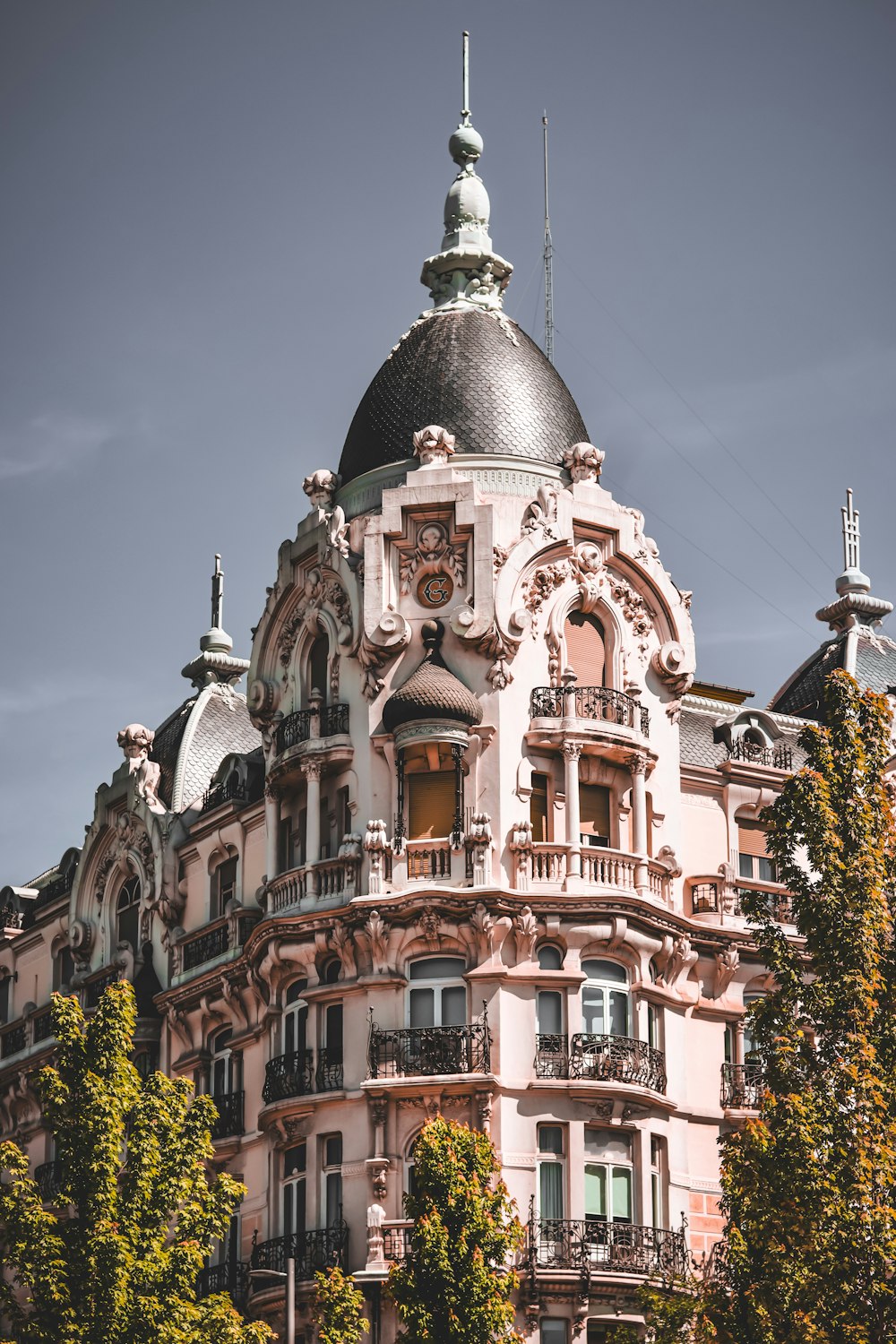 a large building with a clock on the top of it