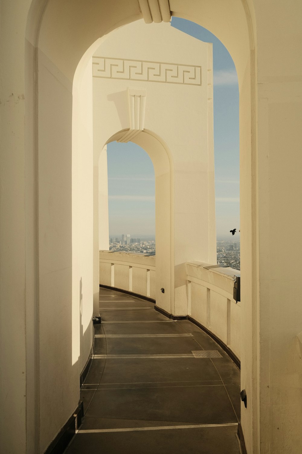 an archway leading to the top of a building