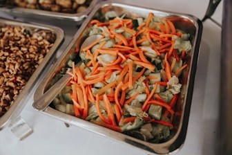 a close up of trays of food on a table