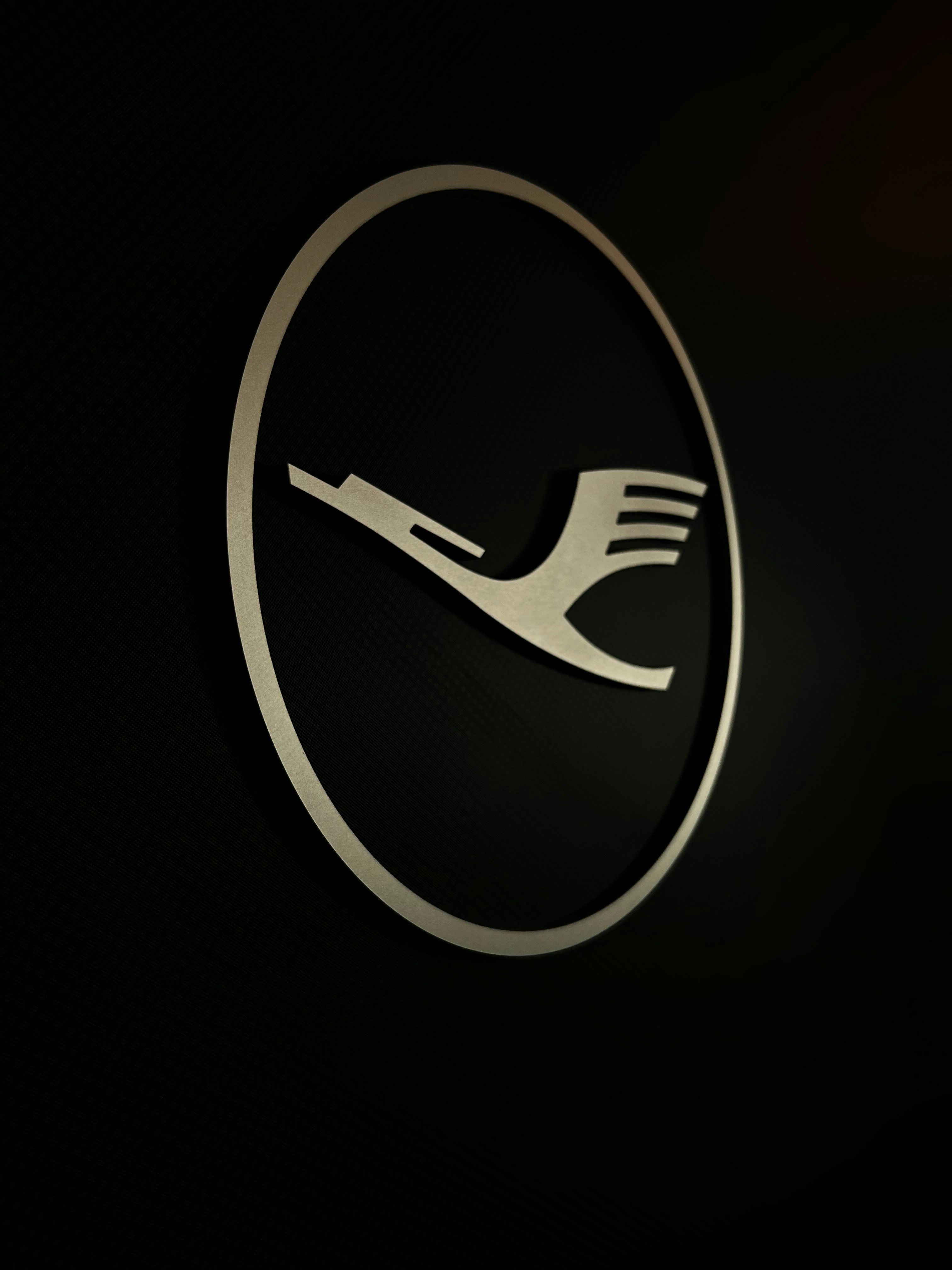 a logo of a fork on a black background