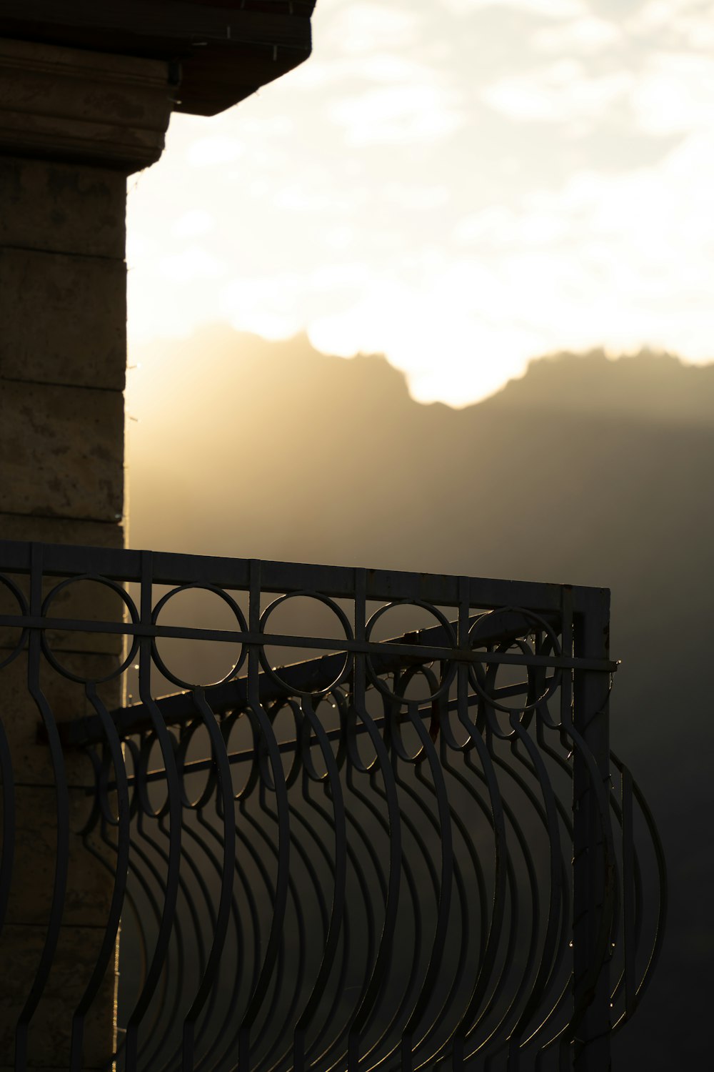 a view of the mountains from a balcony