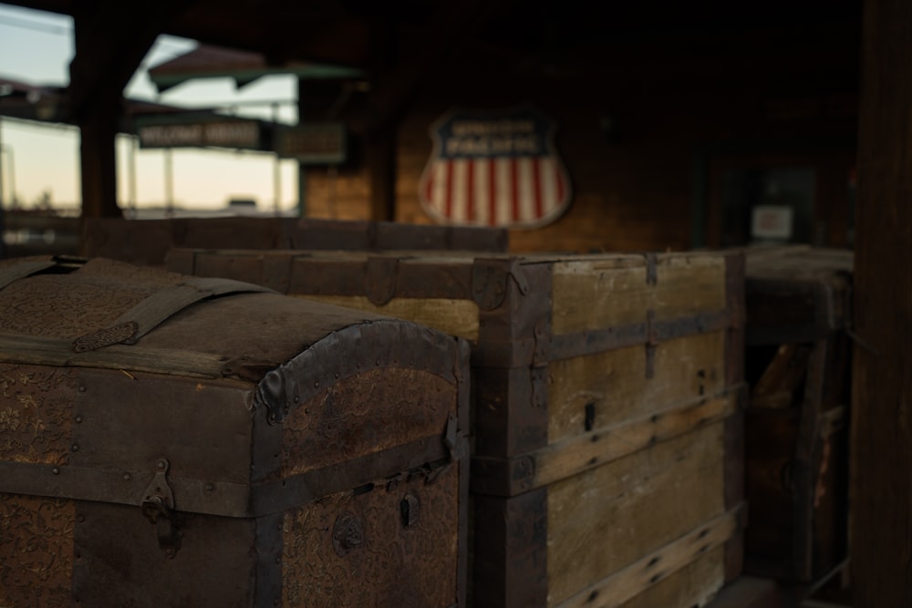 a large wooden trunk sitting next to a building