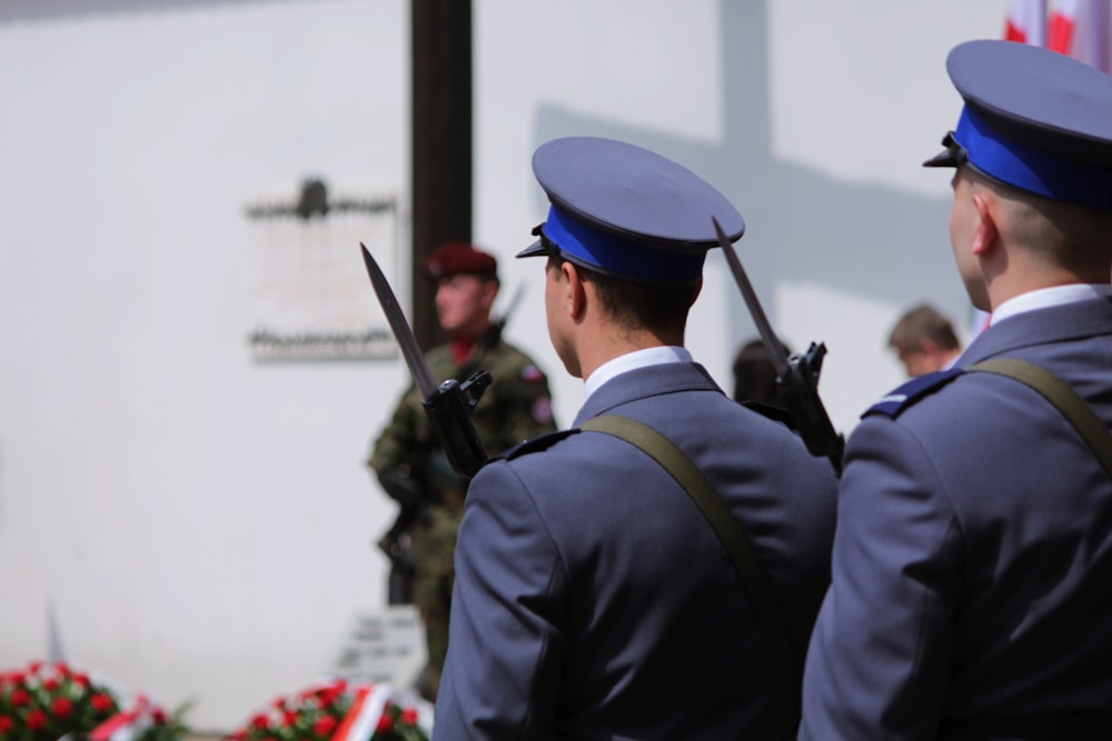 a group of men in uniform standing next to each other