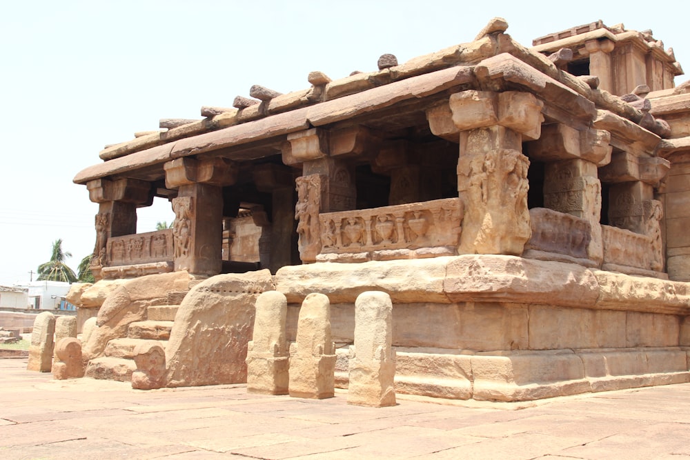 a stone structure with carvings on the sides of it