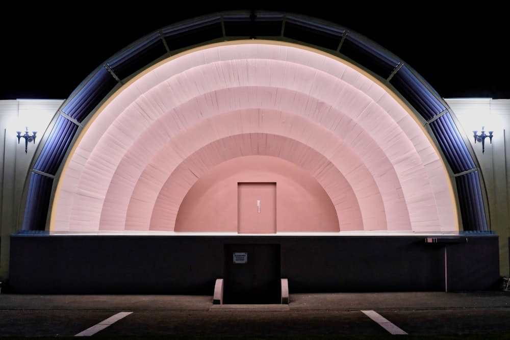 a large tunnel with a door in the middle of it