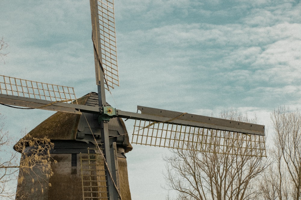 a windmill with a wind indicator on top of it