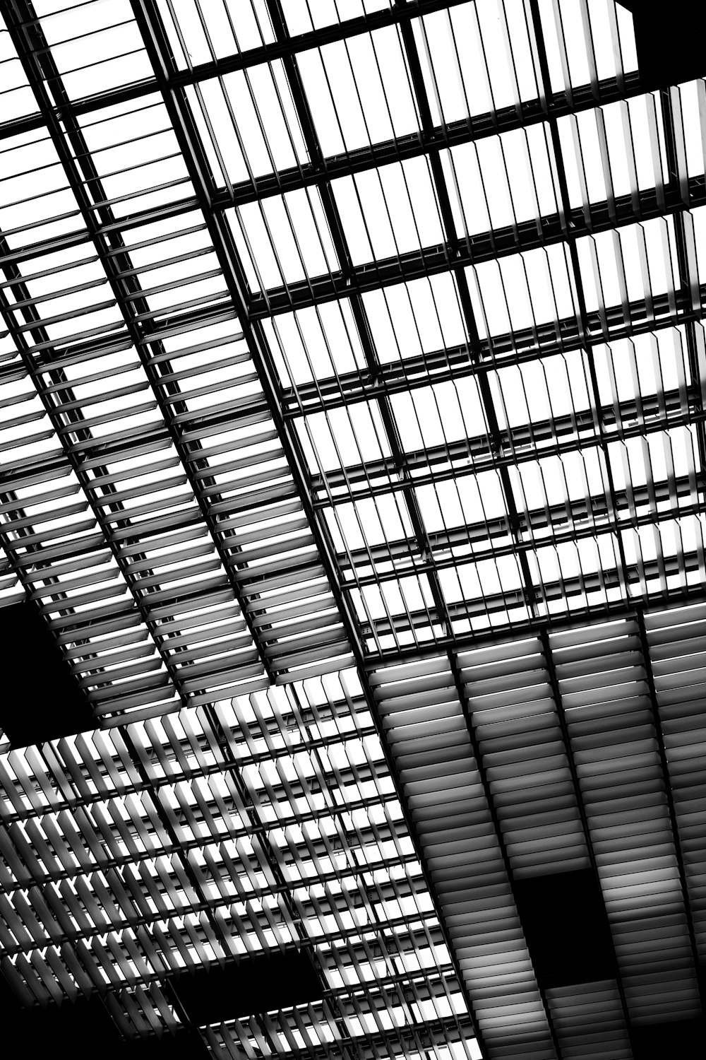 a black and white photo of a ceiling