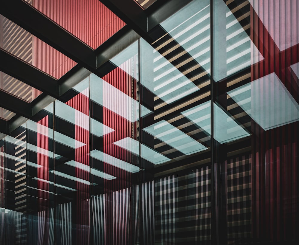 a room with a red and white striped ceiling